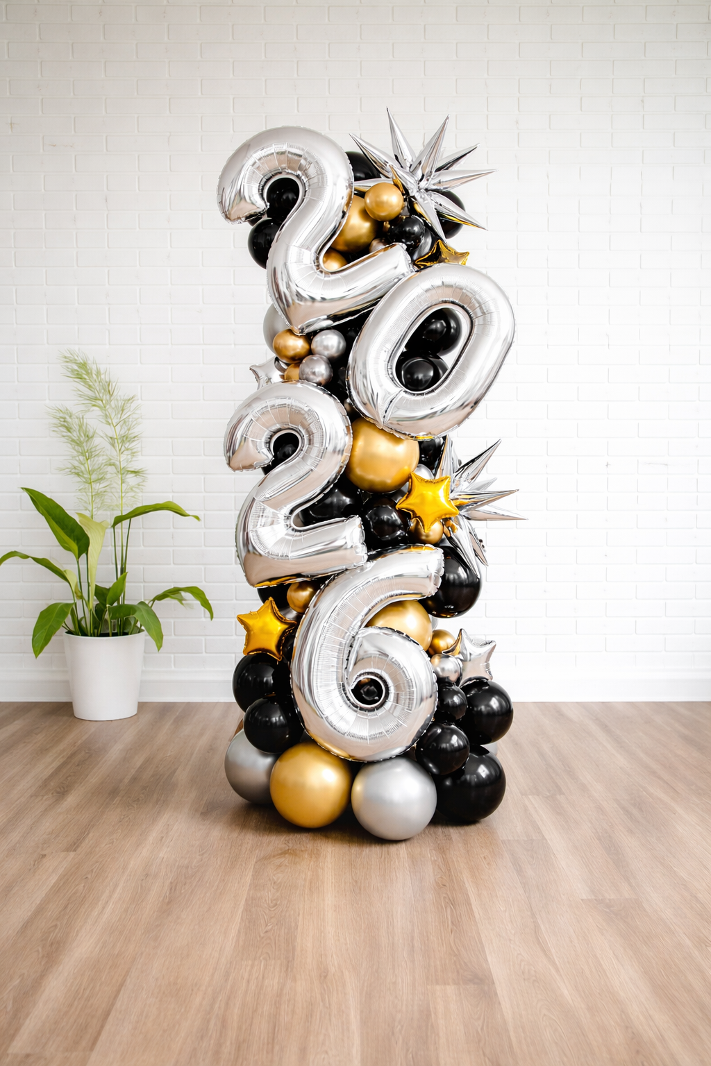 2026 New Year balloon column with silver number balloons and black gold decor