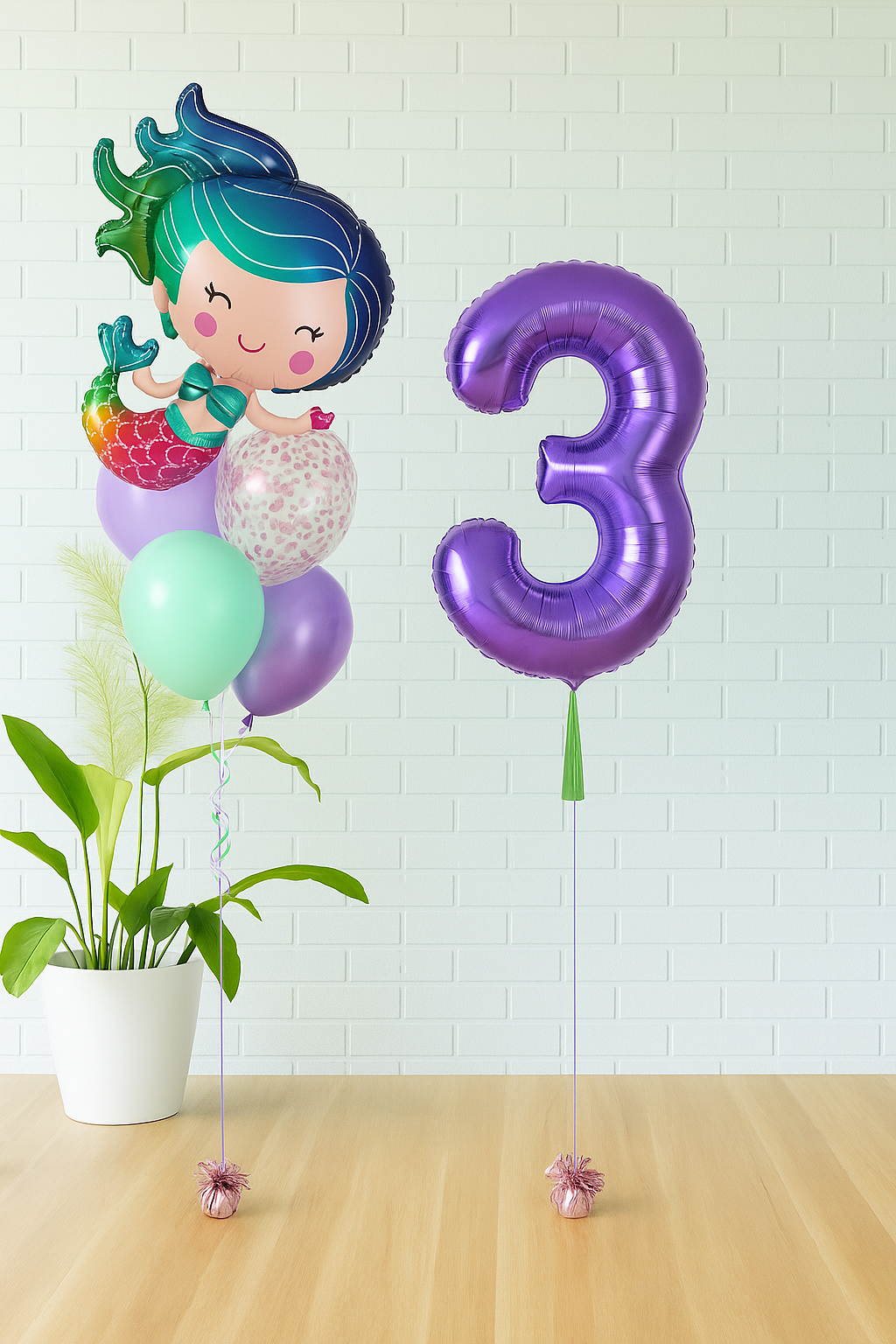 Mermaid birthday balloon bouquet with mermaid foil balloon, jumbo number balloon, and pastel aqua, lavender, and confetti balloons. Available in Evans GA, Augusta, North Augusta, and Aiken.